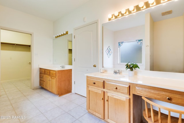 full bathroom with tile patterned flooring and vanity