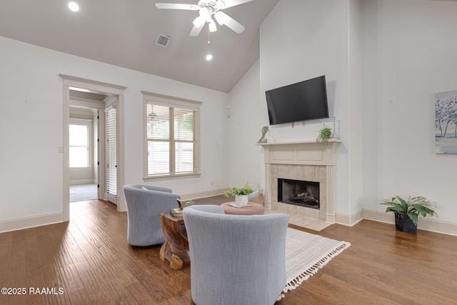 313 Summerland Key Ln, Lafayette, LA 70508 - living area featuring ceiling fan, a fireplace, high vaulted ceiling, recessed lighting, and wood finished floors