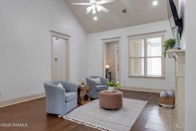 313 Summerland Key Ln, Lafayette, LA 70508 - living area with visible vents, wood finished floors, baseboards, high vaulted ceiling, and a ceiling fan