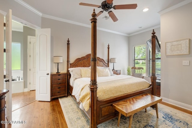 bedroom featuring baseboards, light wood-type flooring, crown molding, and recessed lighting