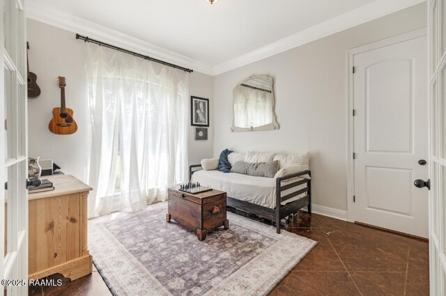 living room with ornamental molding and baseboards