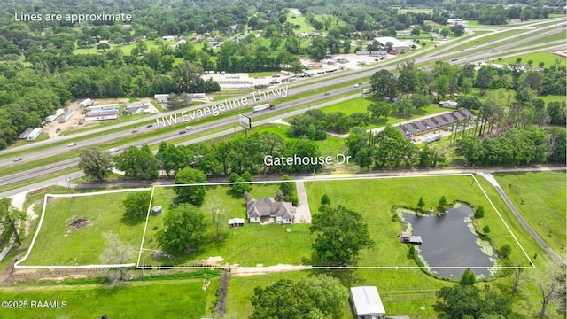 birds eye view of property featuring a water view