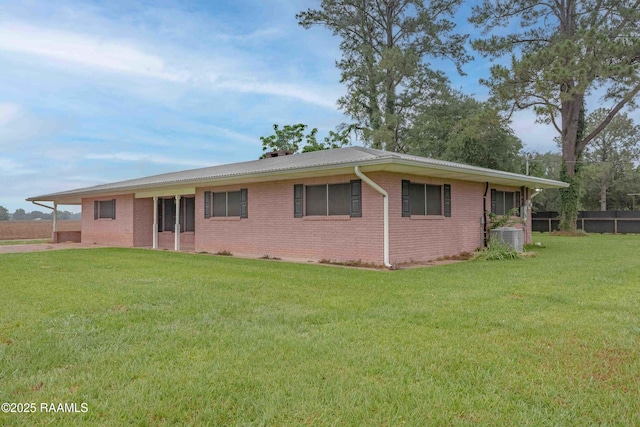 1706 Fuselier Rd, Arnaudville, LA 70512 - view of side of home with brick siding and cooling unit