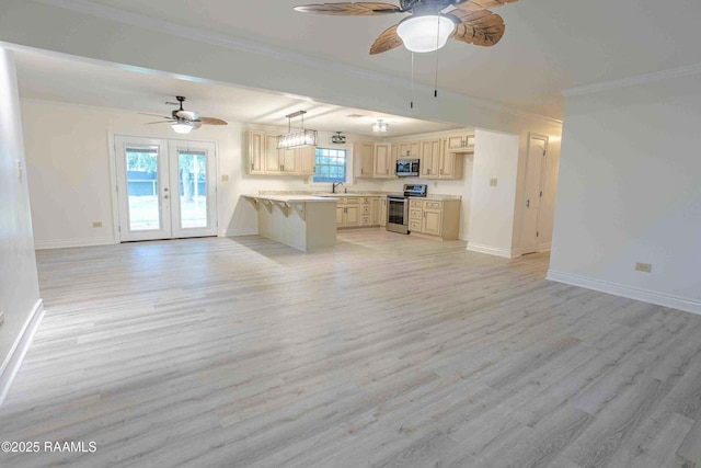 1706 Fuselier Rd, Arnaudville, LA 70512 - unfurnished living room featuring a ceiling fan, ornamental molding, a sink, baseboards, and light wood-type flooring