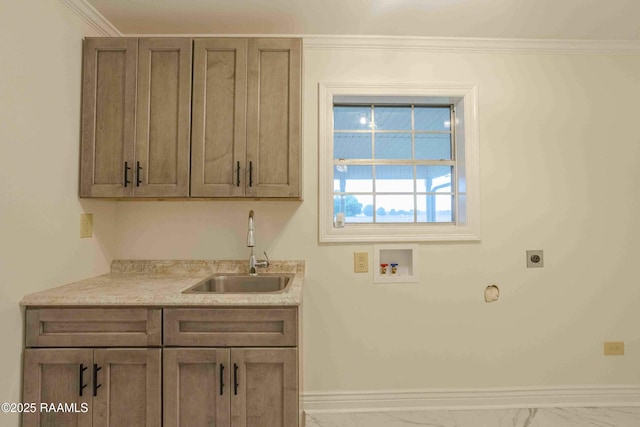 1706 Fuselier Rd, Arnaudville, LA 70512 - washroom featuring hookup for an electric dryer, hookup for a washing machine, cabinet space, marble look tiles, and baseboards