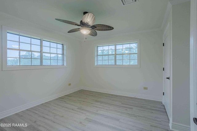 1706 Fuselier Rd, Arnaudville, LA 70512 - empty room featuring crown molding, wood finished floors, baseboards, and a ceiling fan