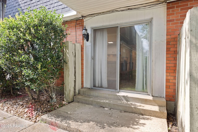 211 Versailles Blvd Unit 5, Lafayette, LA 70501 - doorway to property with brick siding