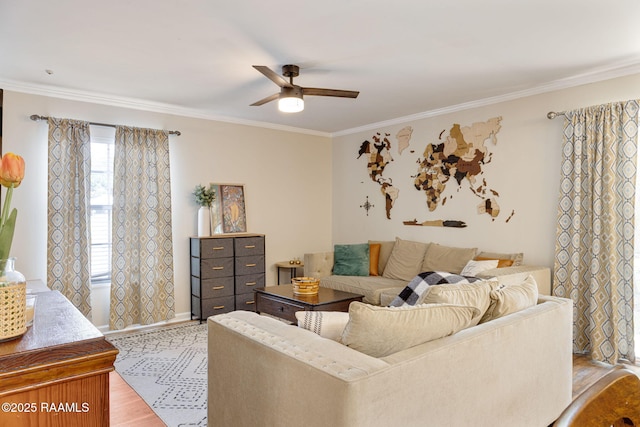 211 Versailles Blvd Unit 5, Lafayette, LA 70501 - living room with light wood-type flooring, a ceiling fan, baseboards, and ornamental molding
