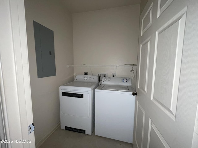 laundry area with independent washer and dryer, electric panel, and laundry area