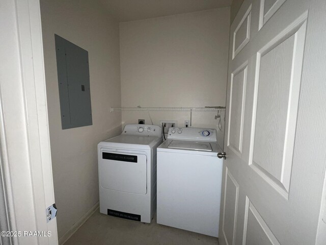 laundry area with independent washer and dryer, electric panel, and laundry area