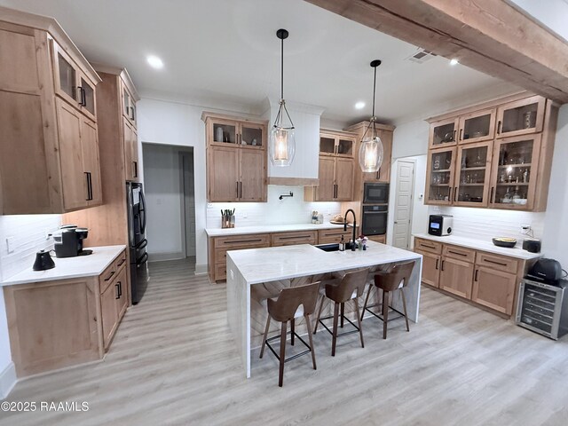 104 Cherrywood Dr, Lafayette, LA 70508 - kitchen featuring a sink, black microwave, backsplash, a breakfast bar, and recessed lighting