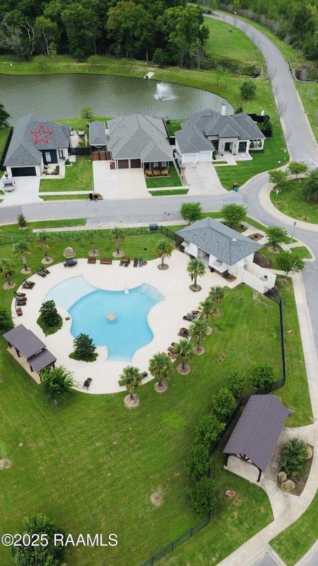 104 Cherrywood Dr, Lafayette, LA 70508 - aerial view of property and surrounding area featuring a nearby body of water and a pool area