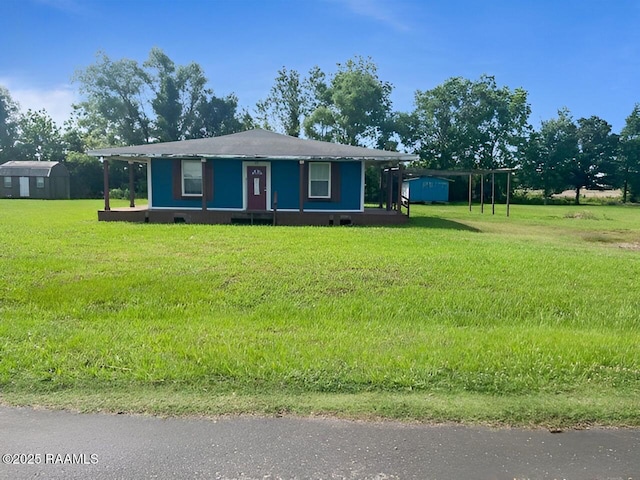 428 Nonc Lol Dr, Arnaudville, LA 70512 - view of front of property featuring an outbuilding and a front yard