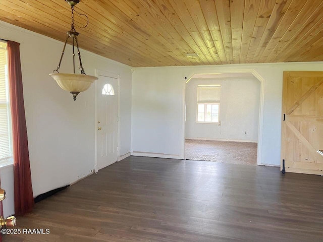 428 Nonc Lol Dr, Arnaudville, LA 70512 - unfurnished dining area featuring baseboards, wooden ceiling, and wood finished floors