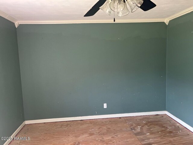 428 Nonc Lol Dr, Arnaudville, LA 70512 - unfurnished room with crown molding, a ceiling fan, and baseboards