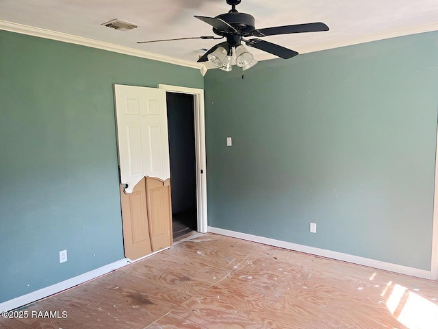 428 Nonc Lol Dr, Arnaudville, LA 70512 - empty room featuring baseboards, ceiling fan, ornamental molding, and visible vents