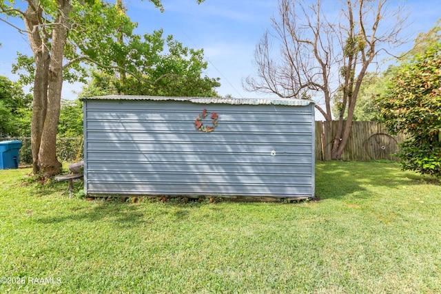 view of shed with fence private yard