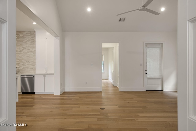 102 Drifting Sands Ln, Lafayette, LA 70503 - spare room featuring visible vents, ceiling fan, vaulted ceiling, and baseboards