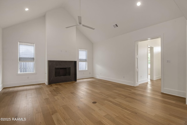 102 Drifting Sands Ln, Lafayette, LA 70503 - unfurnished living room featuring high vaulted ceiling, light wood-type flooring, a ceiling fan, visible vents, and baseboards