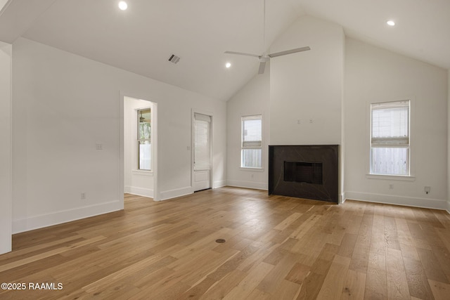 102 Drifting Sands Ln, Lafayette, LA 70503 - unfurnished living room featuring recessed lighting, visible vents, light wood-style flooring, and a fireplace