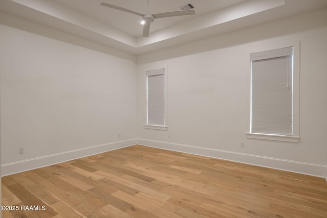 102 Drifting Sands Ln, Lafayette, LA 70503 - unfurnished room featuring baseboards, visible vents, and a tray ceiling