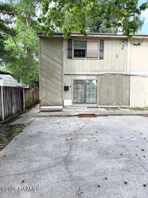 2711 E Simcoe St Unit 8, Lafayette, LA 70501 - rear view of property with fence