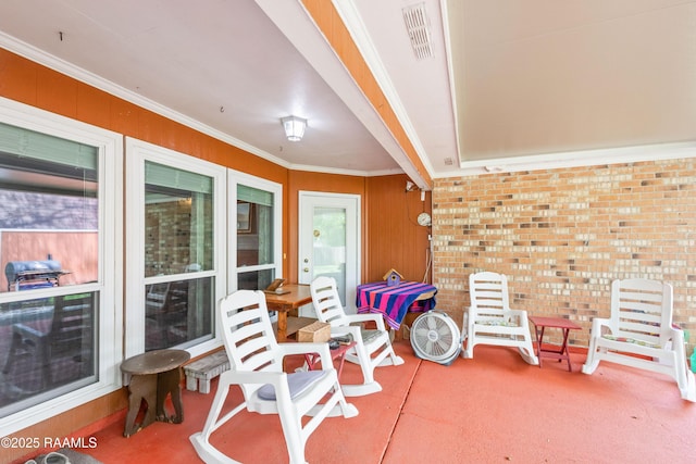 view of patio featuring visible vents and area for grilling