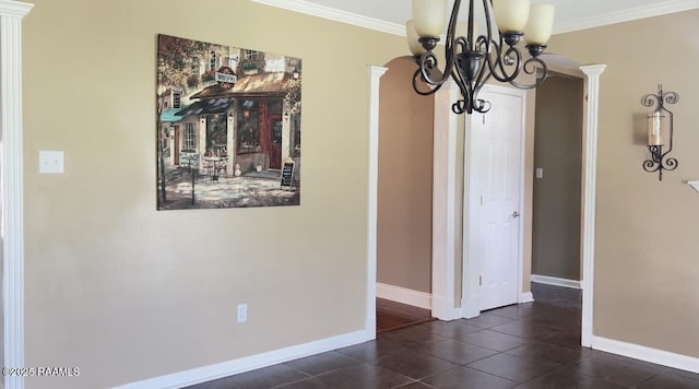 707 W Pine St, Erath, LA 70533 - tiled spare room featuring a chandelier, baseboards, crown molding, and ornate columns