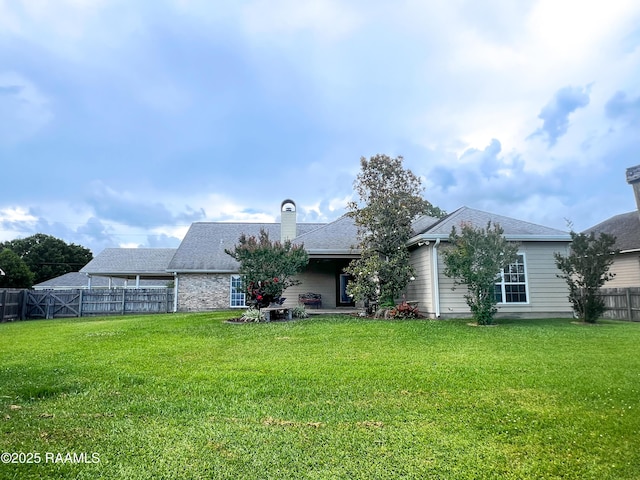 707 W Pine St, Erath, LA 70533 - back of house with a chimney