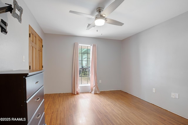 111 W Oaklawn Dr, Franklin, LA 70538 - unfurnished bedroom with a ceiling fan and light wood-type flooring