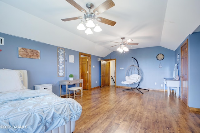 111 W Oaklawn Dr, Franklin, LA 70538 - bedroom featuring baseboards, visible vents, light wood finished floors, and lofted ceiling