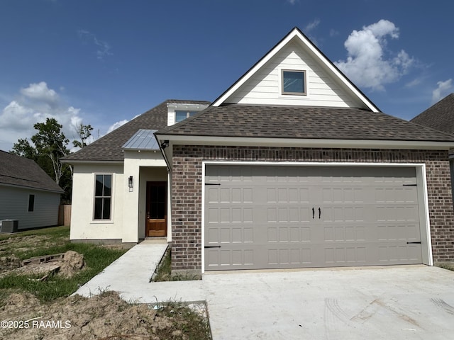 111 Fillmore Way, Lafayette, LA 70506 - view of front of property featuring roof with shingles, an attached garage, brick siding, and driveway