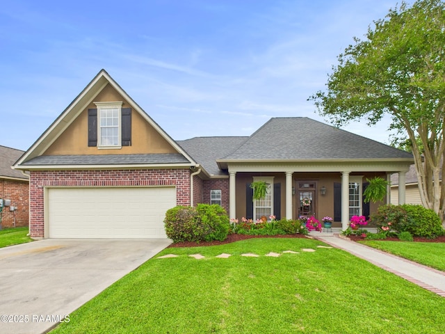 124 Vestige Cir, Lafayette, LA 70508 - view of front of house featuring a front yard, driveway, roof with shingles, and brick siding
