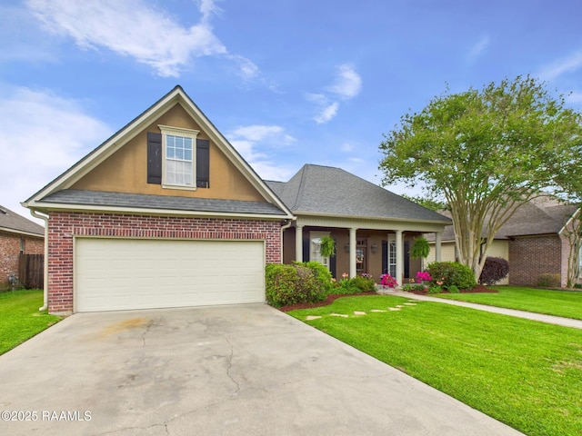 124 Vestige Cir, Lafayette, LA 70508 - view of front of property with a front lawn, a garage, brick siding, roof with shingles, and concrete driveway