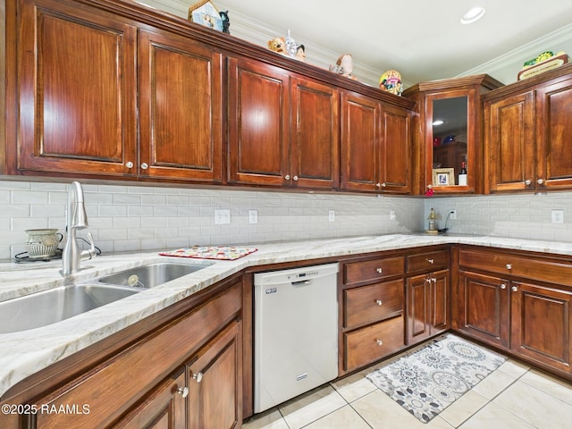 124 Vestige Cir, Lafayette, LA 70508 - kitchen with a sink, light tile patterned floors, dishwashing machine, and backsplash