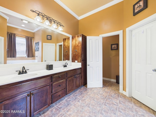 124 Vestige Cir, Lafayette, LA 70508 - bathroom featuring ornamental molding, double vanity, a sink, and baseboards