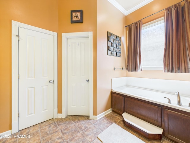 124 Vestige Cir, Lafayette, LA 70508 - full bathroom featuring baseboards, a bath, tile patterned flooring, and crown molding