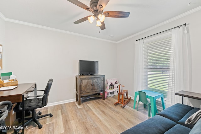 office area featuring crown molding, light wood finished floors, a ceiling fan, and baseboards