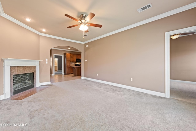 4000 Mchugh Rd Unit 102, Zachary, LA 70791 - unfurnished living room featuring carpet, ceiling fan, arched walkways, crown molding, and recessed lighting