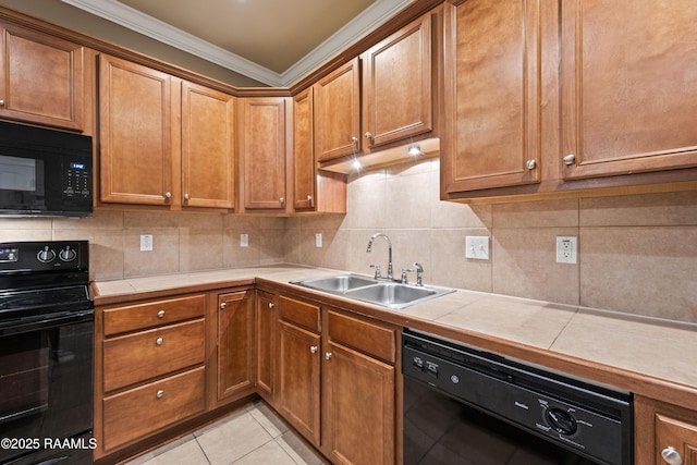 4000 Mchugh Rd Unit 102, Zachary, LA 70791 - kitchen with black appliances, a sink, ornamental molding, tile counters, and backsplash