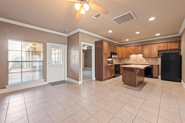 4000 Mchugh Rd Unit 102, Zachary, LA 70791 - kitchen with black appliances, a ceiling fan, light countertops, decorative backsplash, and crown molding