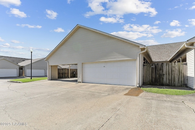4000 Mchugh Rd Unit 102, Zachary, LA 70791 - view of home's exterior with fence and concrete driveway
