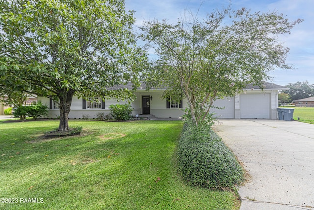 110 Karen Dr, Lafayette, LA 70503 - view of front of house featuring a garage, a front yard, and concrete driveway