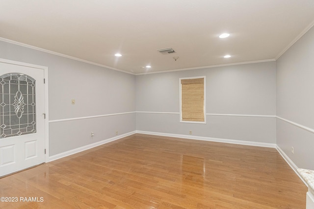 110 Karen Dr, Lafayette, LA 70503 - unfurnished room featuring light wood finished floors, visible vents, recessed lighting, and ornamental molding