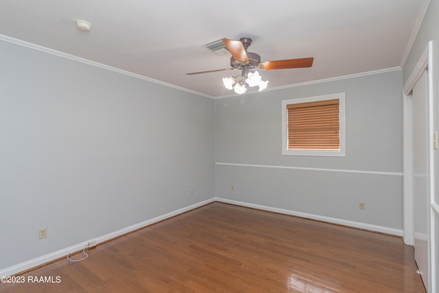110 Karen Dr, Lafayette, LA 70503 - unfurnished bedroom with crown molding, ceiling fan, wood finished floors, and baseboards