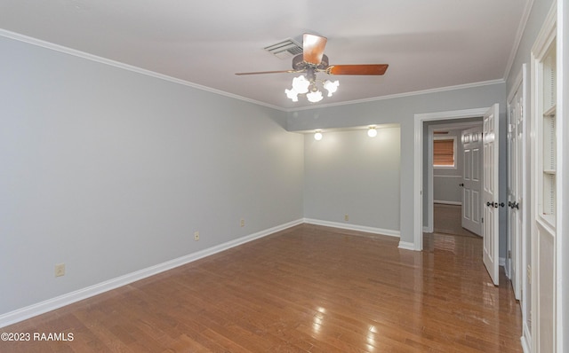 110 Karen Dr, Lafayette, LA 70503 - unfurnished bedroom with ornamental molding, ceiling fan, wood finished floors, and baseboards