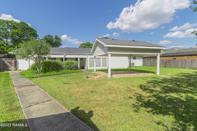 110 Karen Dr, Lafayette, LA 70503 - view of front of house with a gate, fence, and a front yard
