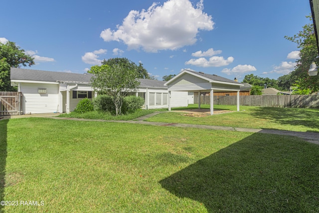 110 Karen Dr, Lafayette, LA 70503 - view of yard featuring a patio and a fenced backyard