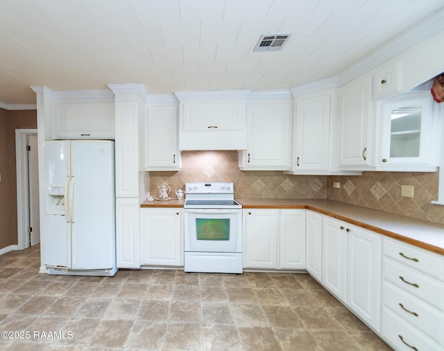 kitchen featuring crown molding, white appliances, white cabinetry, decorative backsplash, and visible vents
