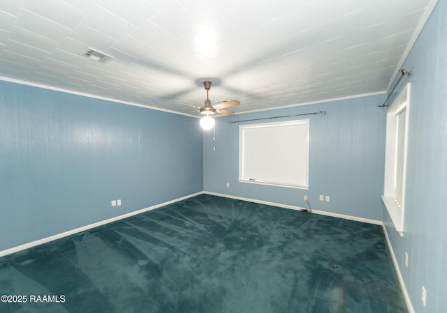 unfurnished room with visible vents, a ceiling fan, baseboards, and carpet floors